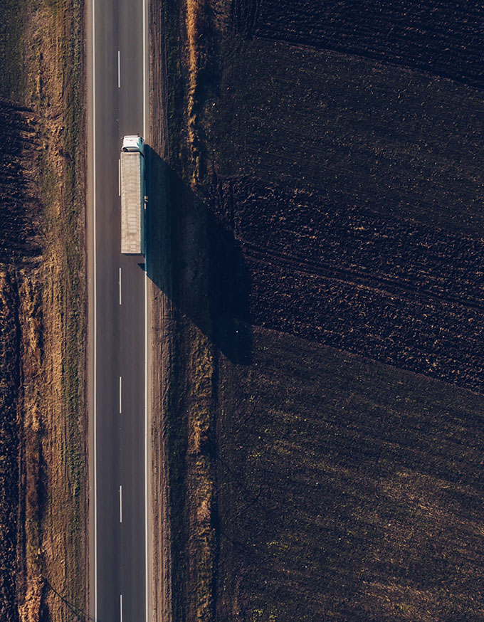 Aerial view of freight transportation truck on the road