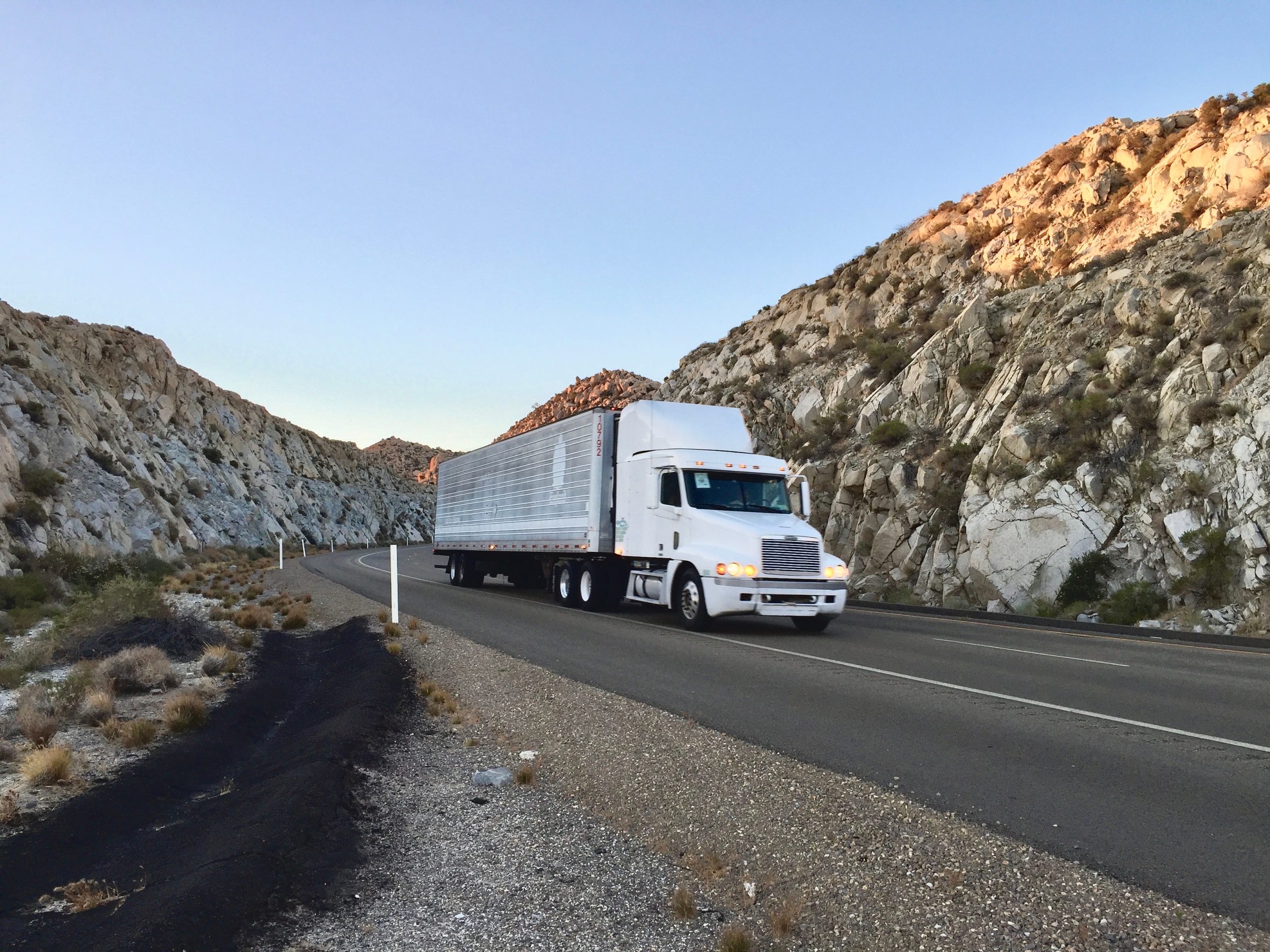 big-rig-on-the-road-through-the-desert-pass-in-cal-2022-11-10-10-36-02-utc