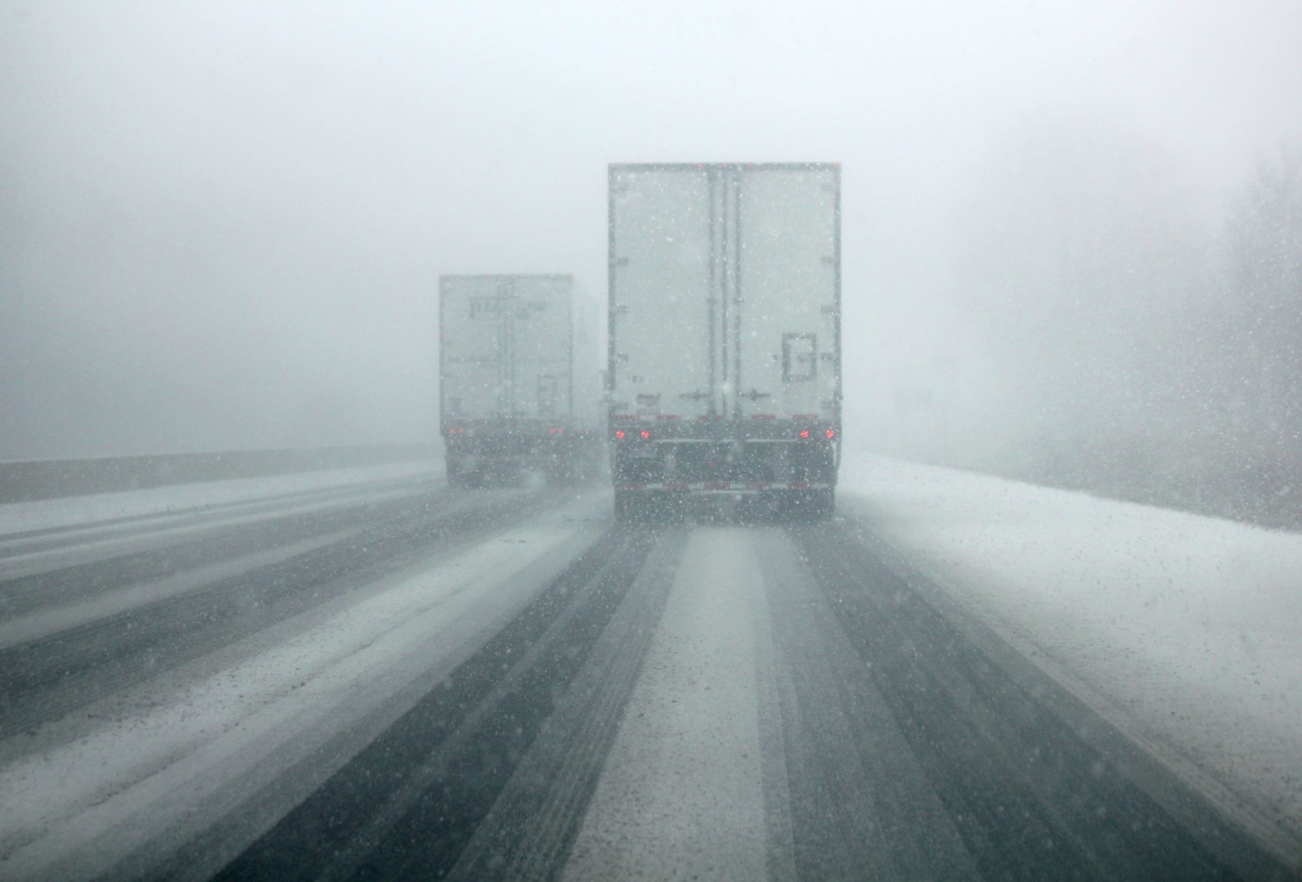 semi-truck-on-a-highway-crossing-colorado-valley-crop
